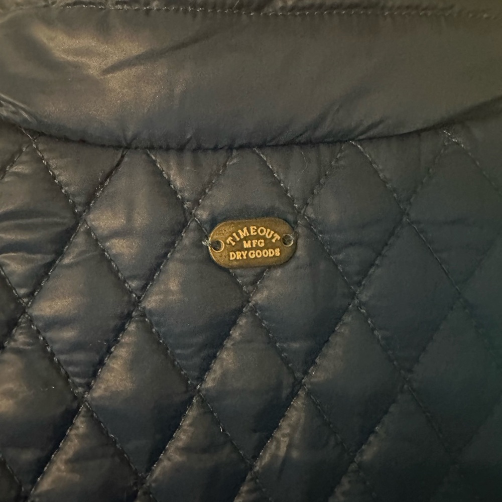 TmeOut sleeveless blue Parka jacket.